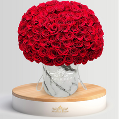 100 red roses in a marble box