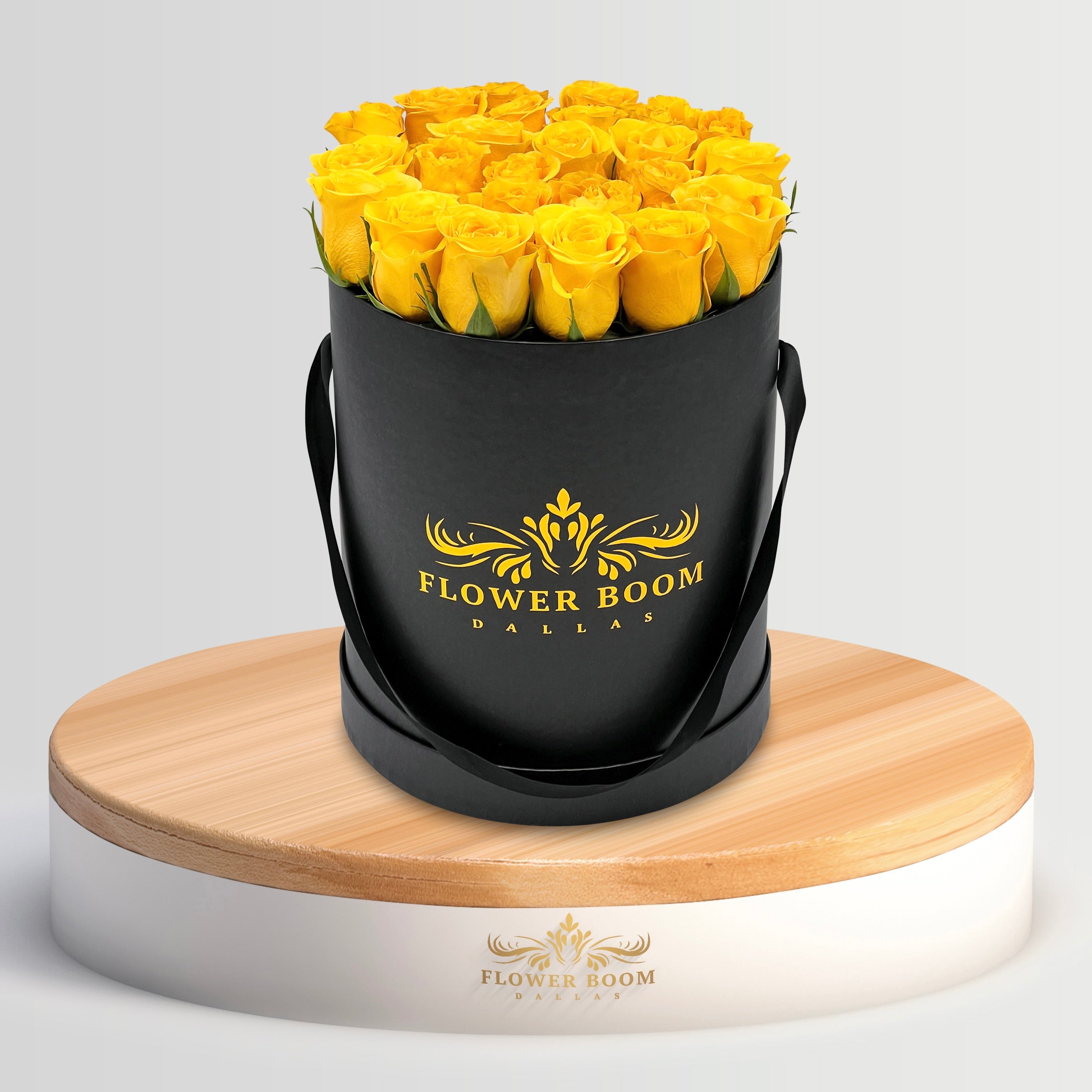 2 dozen yellow roses in a black box