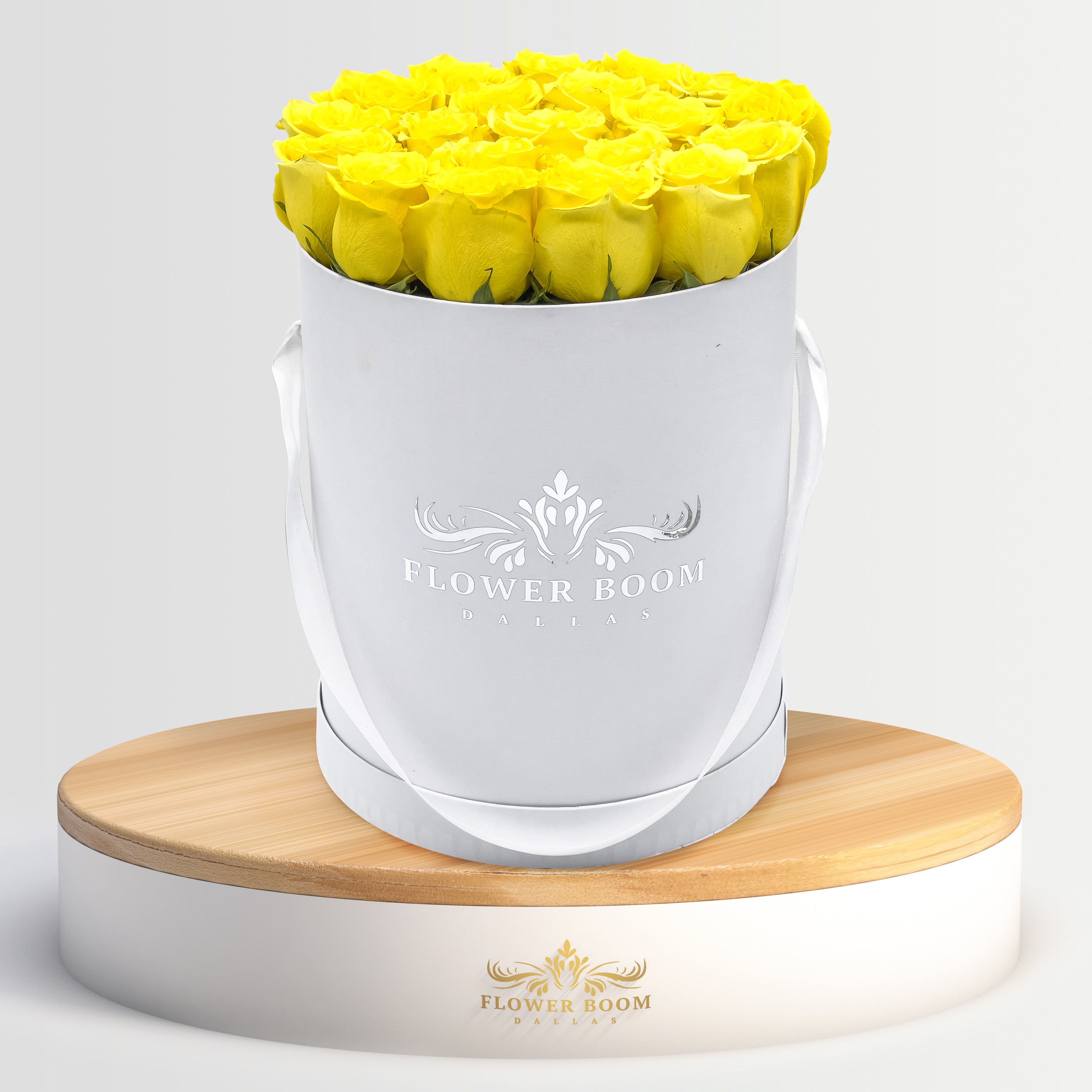 2 dozen yellow roses in a white box