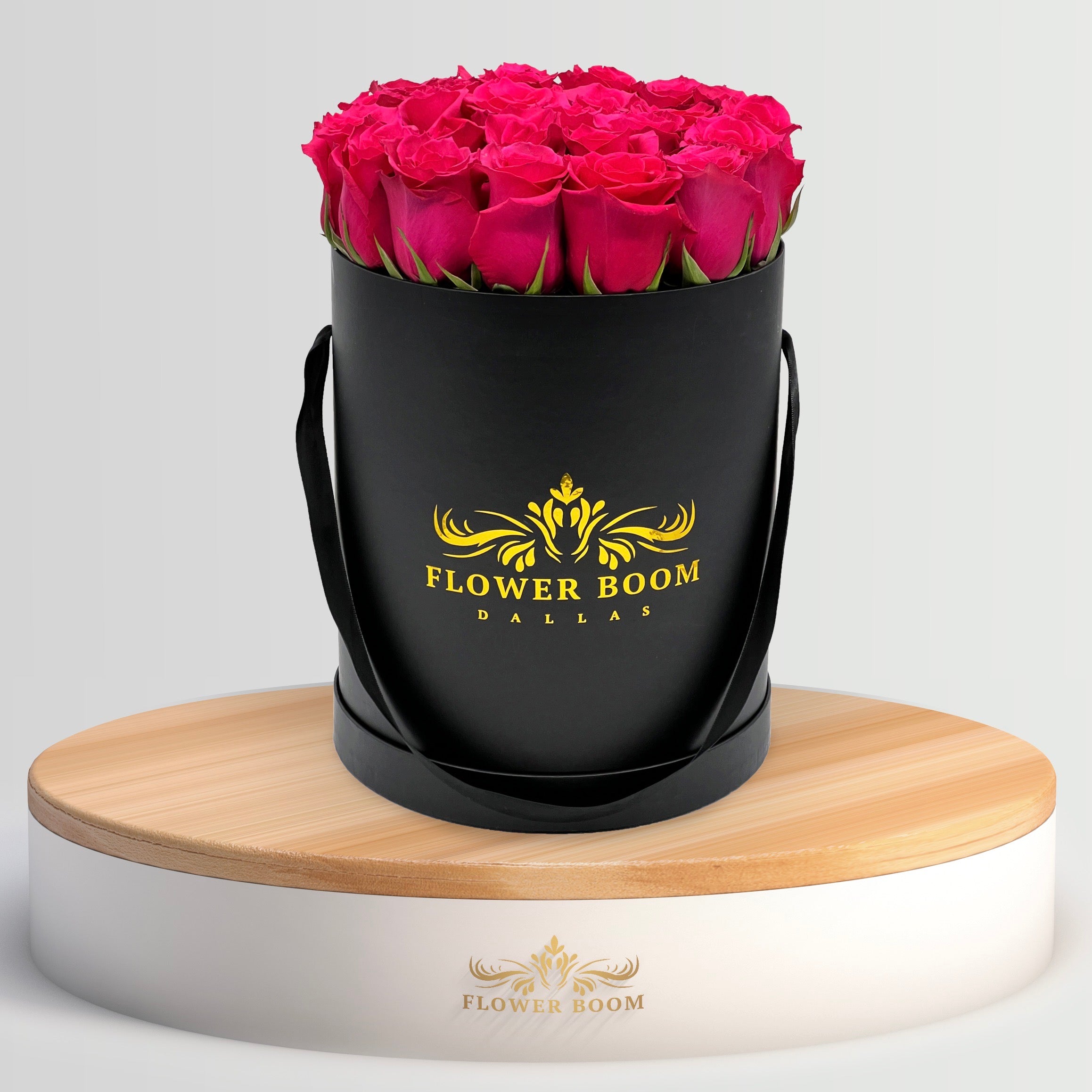 2 dozen Fuchsia hot pink roses in a black box