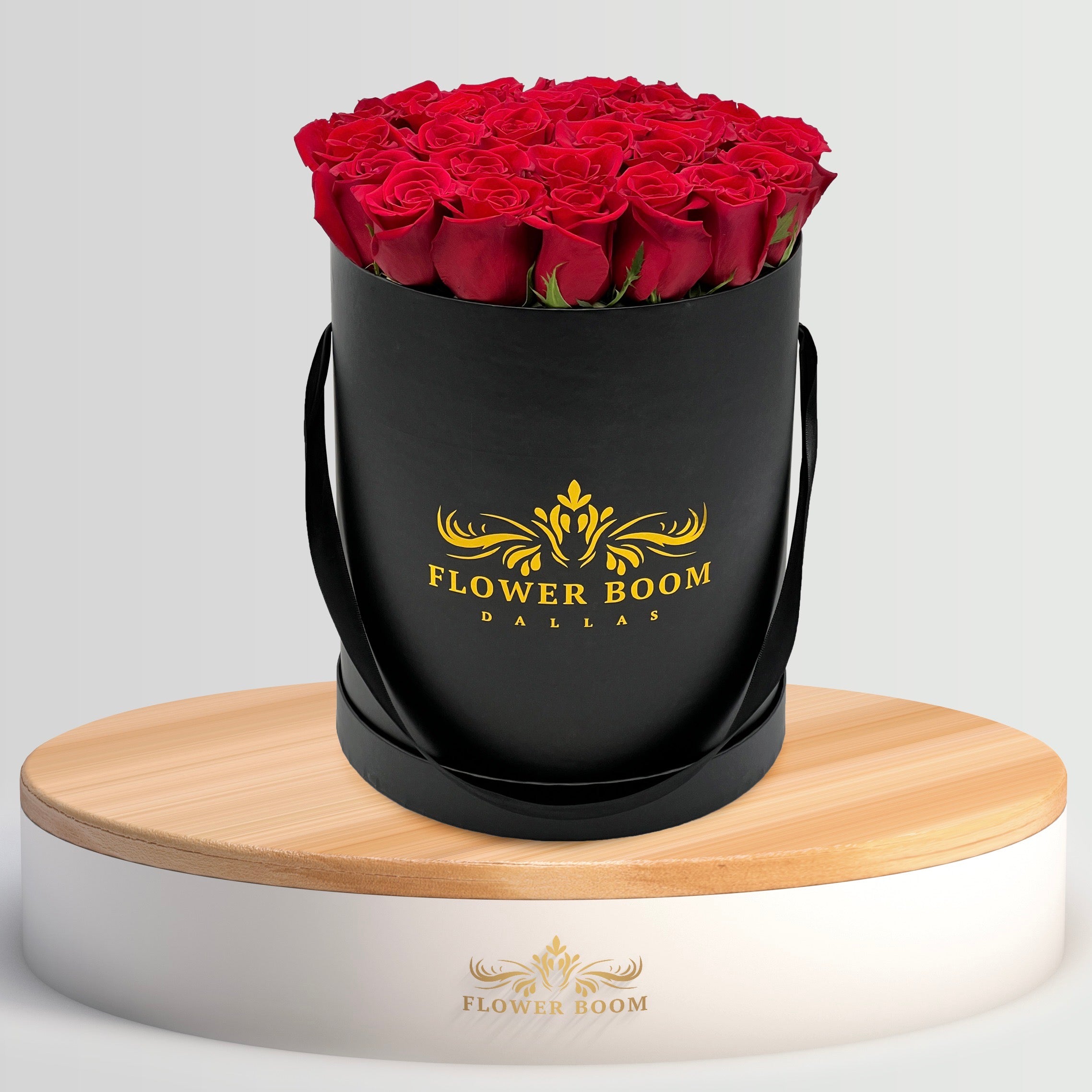 2 dozen red roses in a black box
