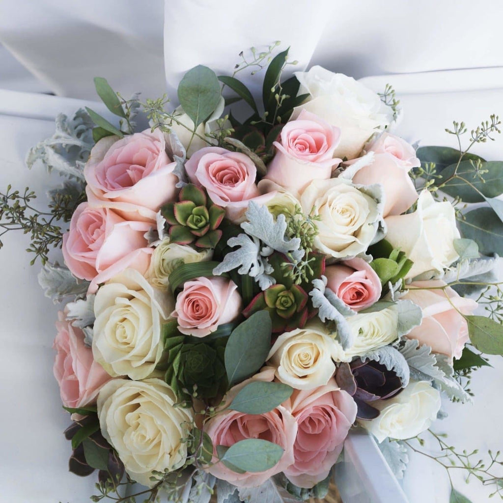 https://flowerboomdallas.com/cdn/shop/products/delicate-bridal-bouquet-440033_1024x1024.jpg?v=1654403705